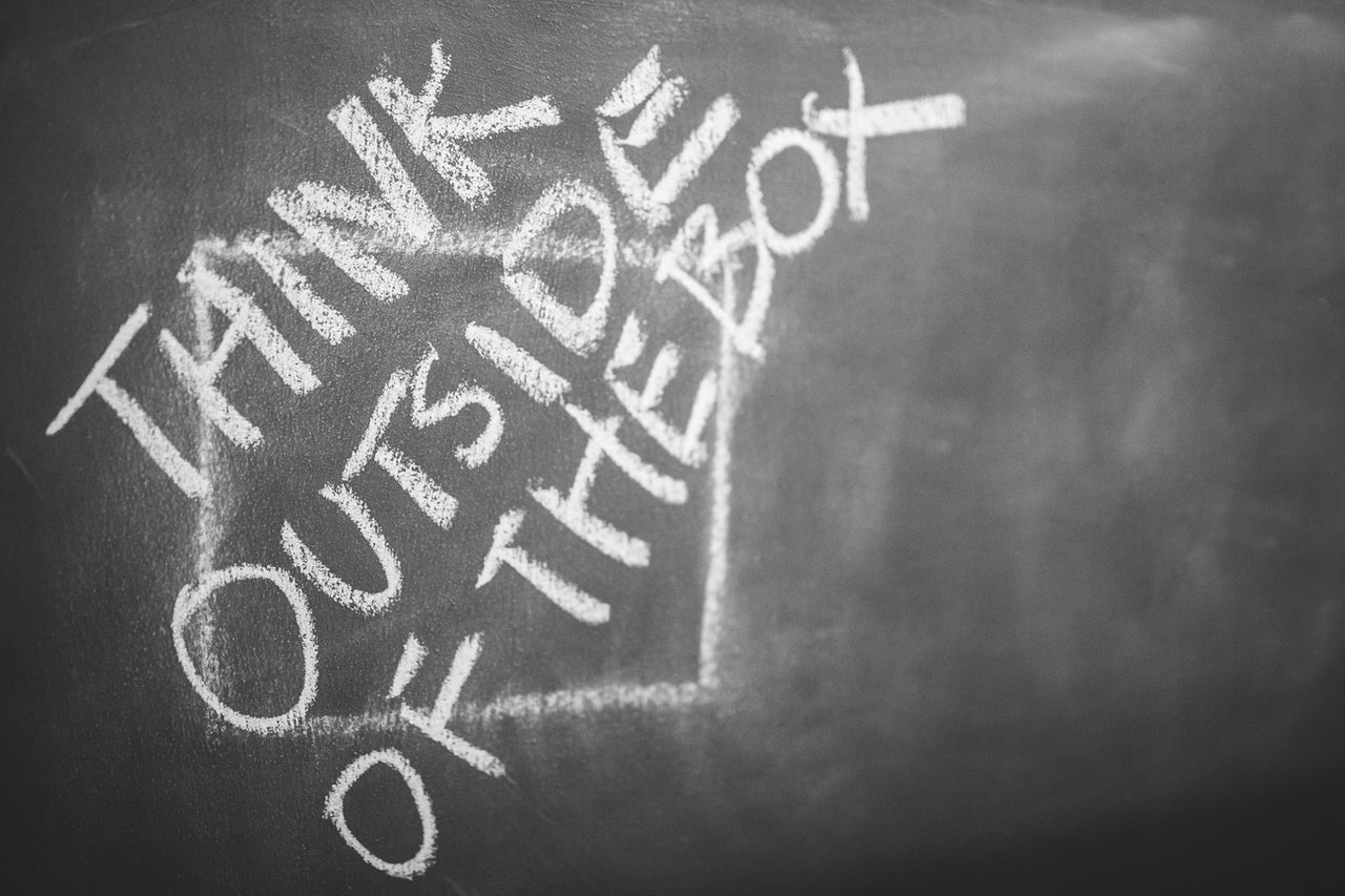 Words written "think outside of the box"
