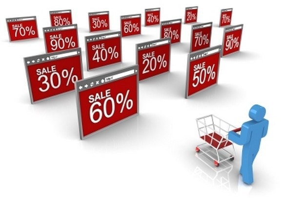 Various discount tags and a human figure pushing a cart