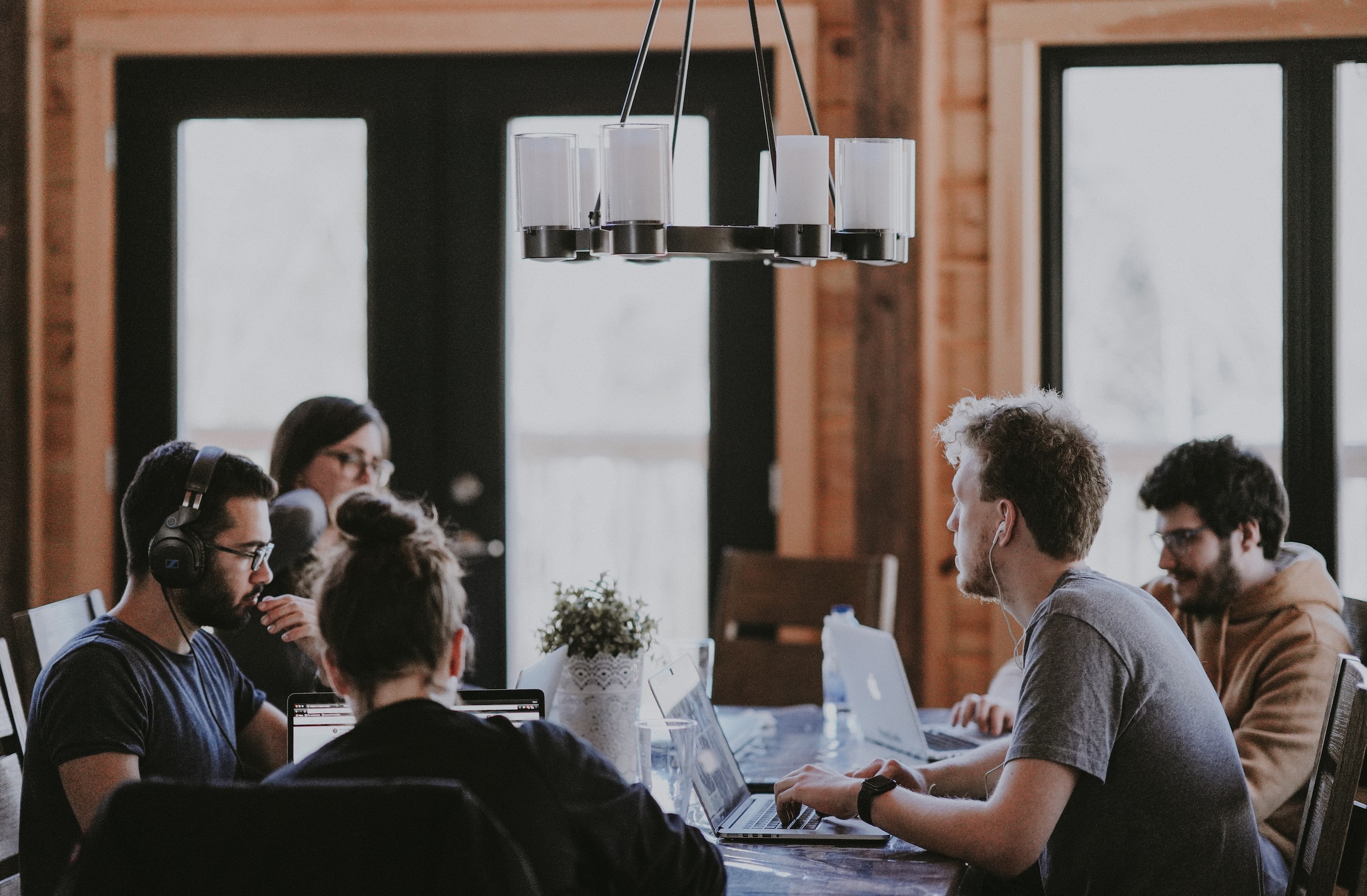 People working in a podcast strategy