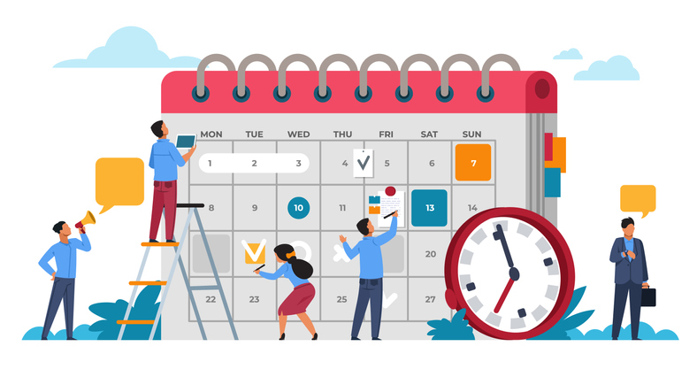 A number of individuals writing on a calendar