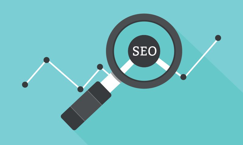 A magnifying glass over the word "SEO"