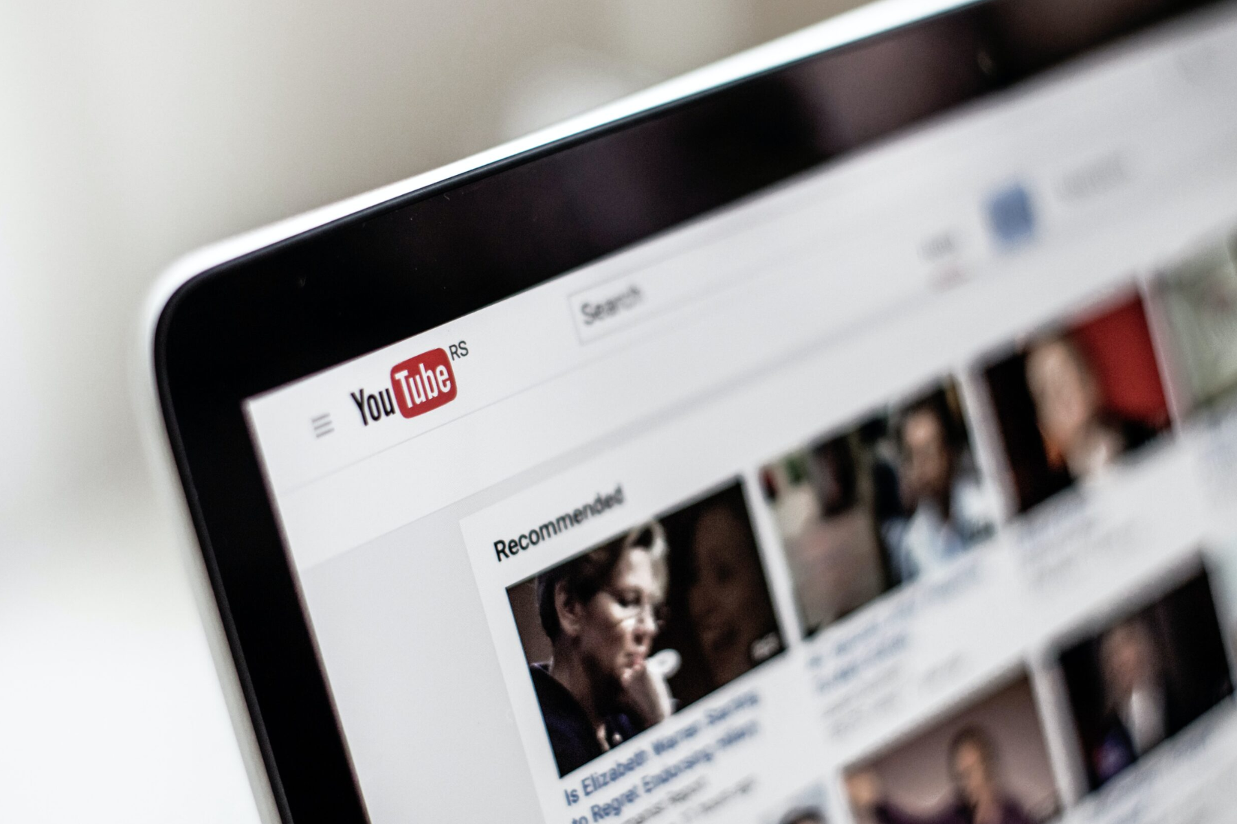 YouTube home page with videos