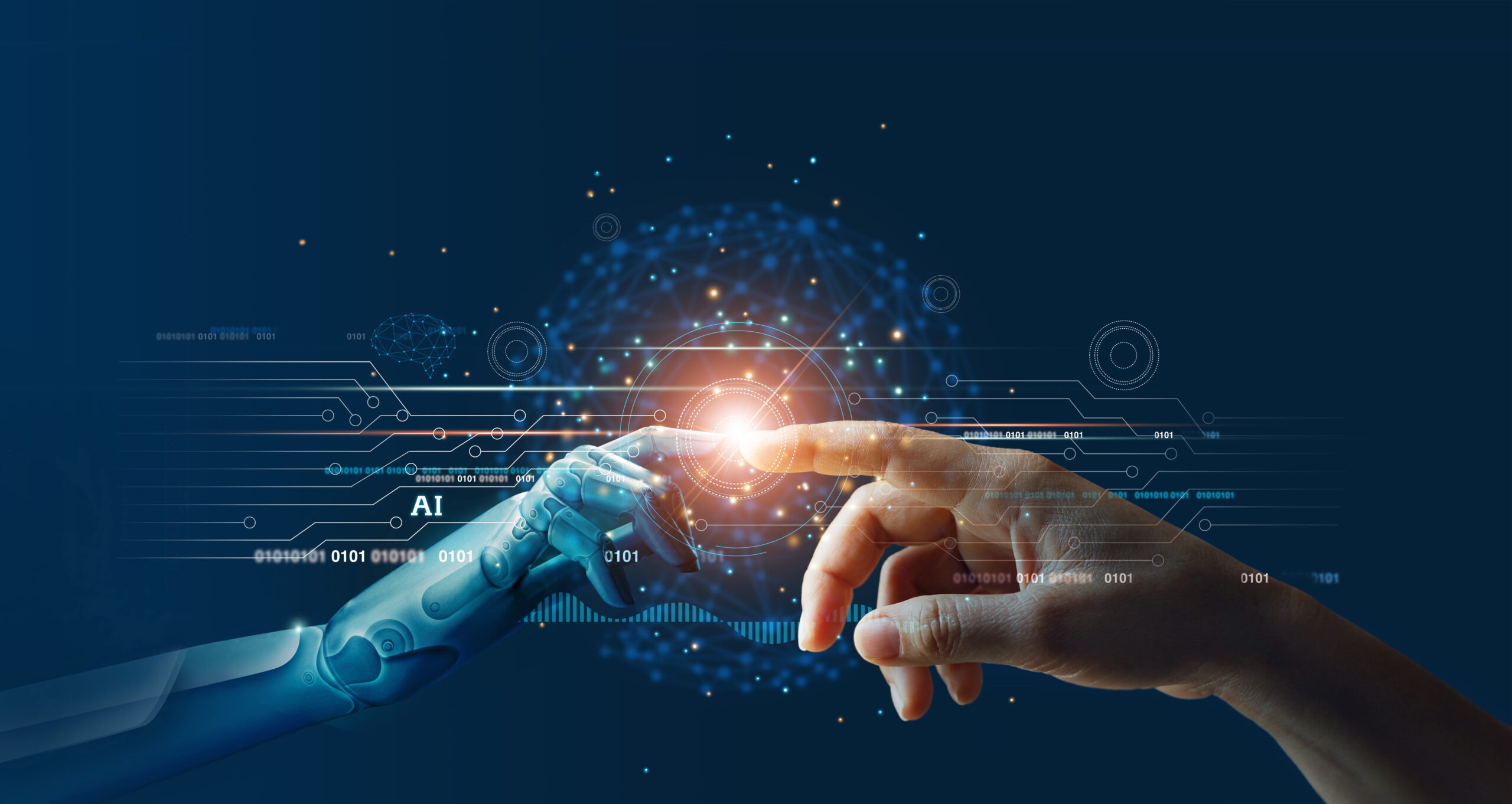 Robotic hand and human hand touching each other