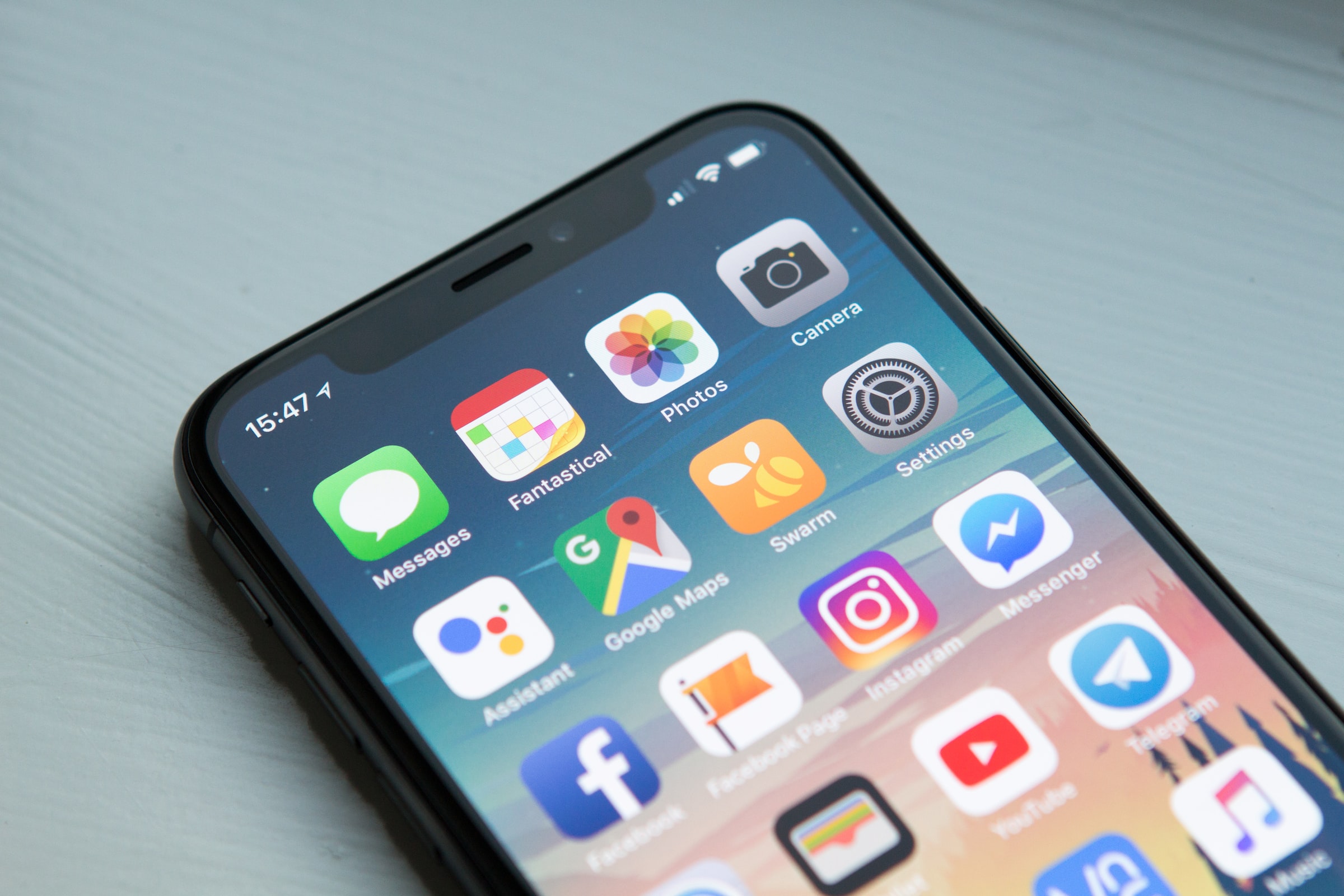 Iphone in main screen with mobile apps