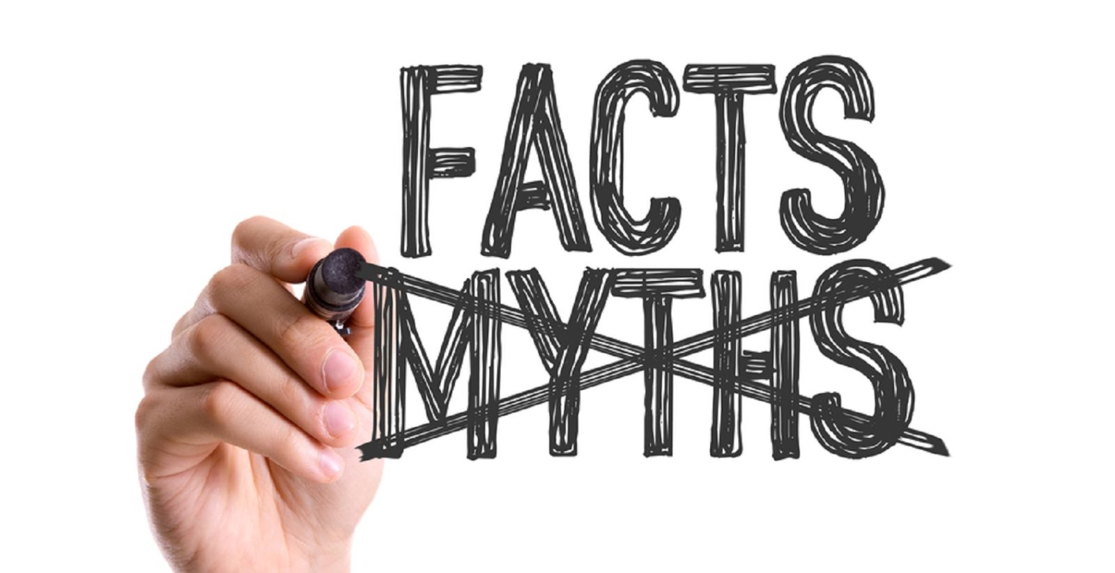 Hand Crossing Out The Word Myths Written Under The Word Facts