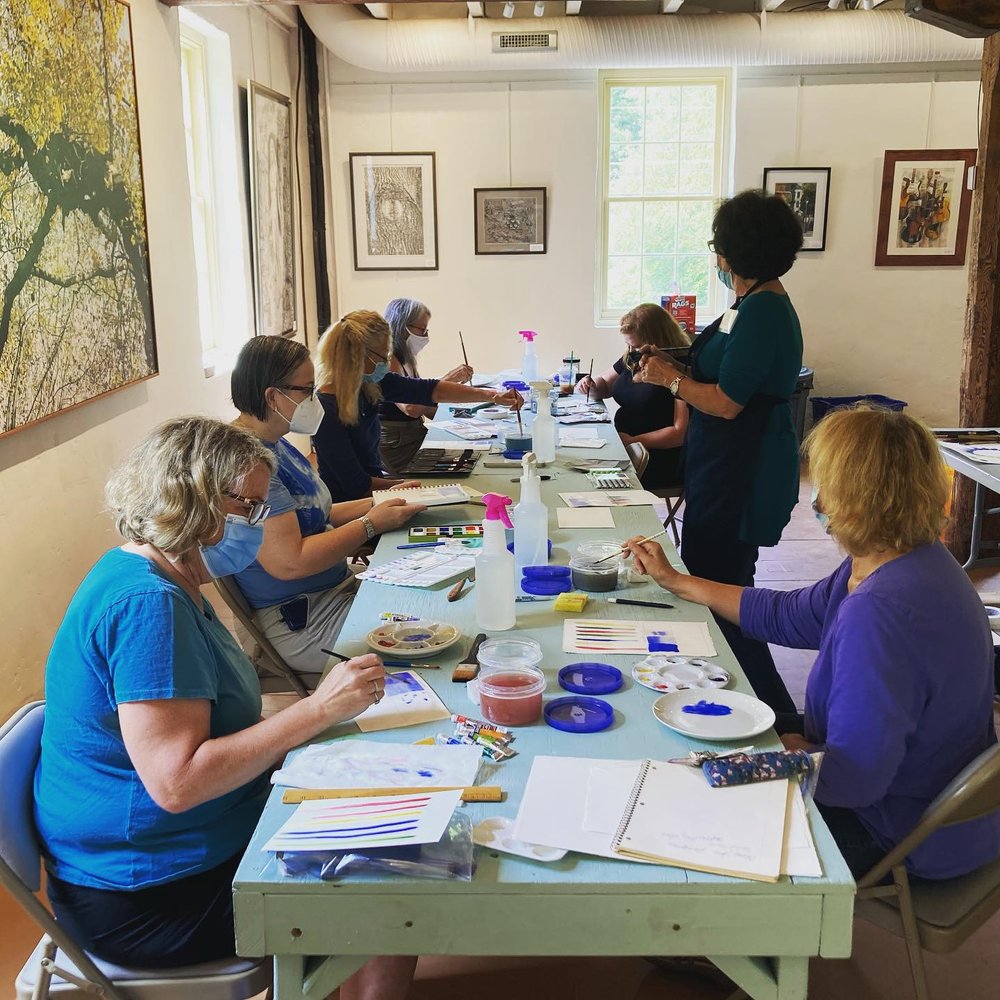 Group of women attending a Free painting Workshops