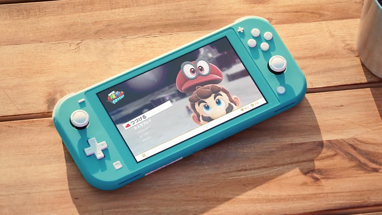 Blue Nintendo switch on a wooden table